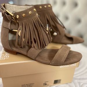 Brand new Michael Kors gladiator sandals . Suede . Size 6.5
